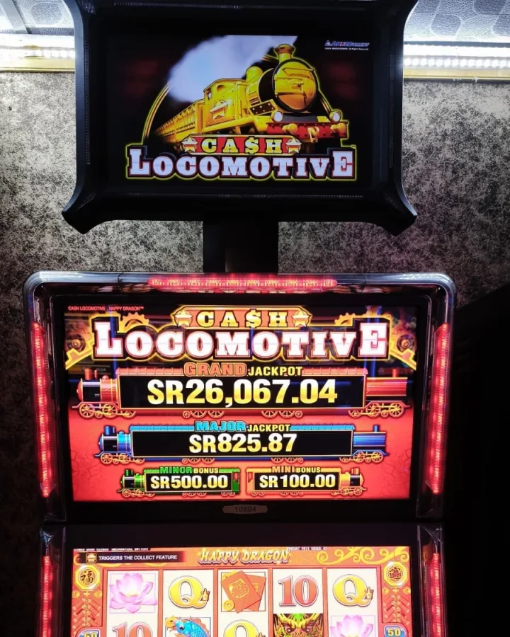 The Cash Locomotive — Happy Dragon machine on the Amusement Centre floor